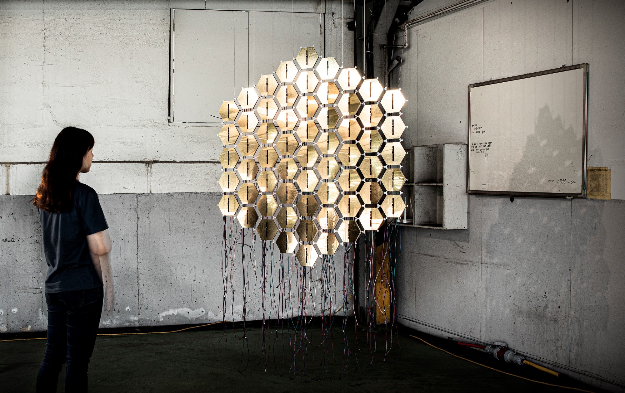 Wilson, 2019, gold sts mirror, honeycomb paper, electronic device, software, variable size, installation view@zer01ne Day